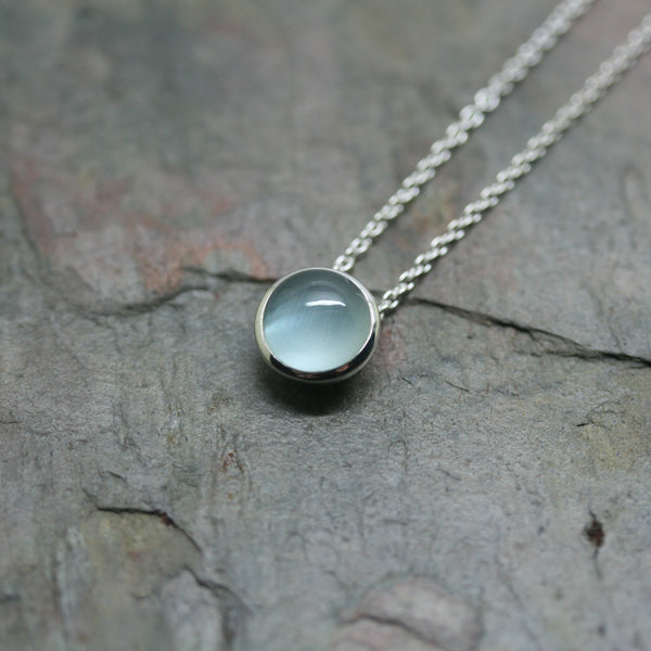QUINN Silver and Blue Topaz Pendant