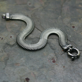SAN Men's Silver Herringbone Flexible Bracelet