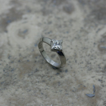 ADAM Platinum and Princess Cut Diamond Engagement Ring