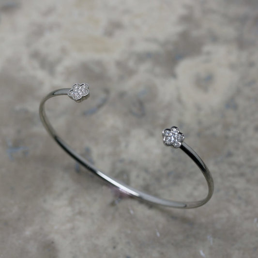 rivoir 18ct white gold and diamond flower bangle