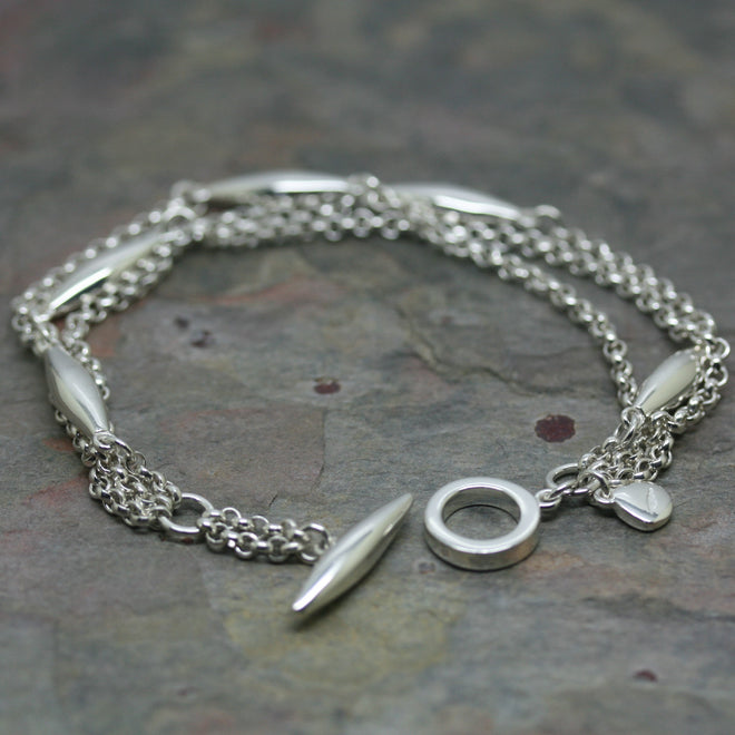 CURT Silver Multi Row Bracelet with Elongated Beads